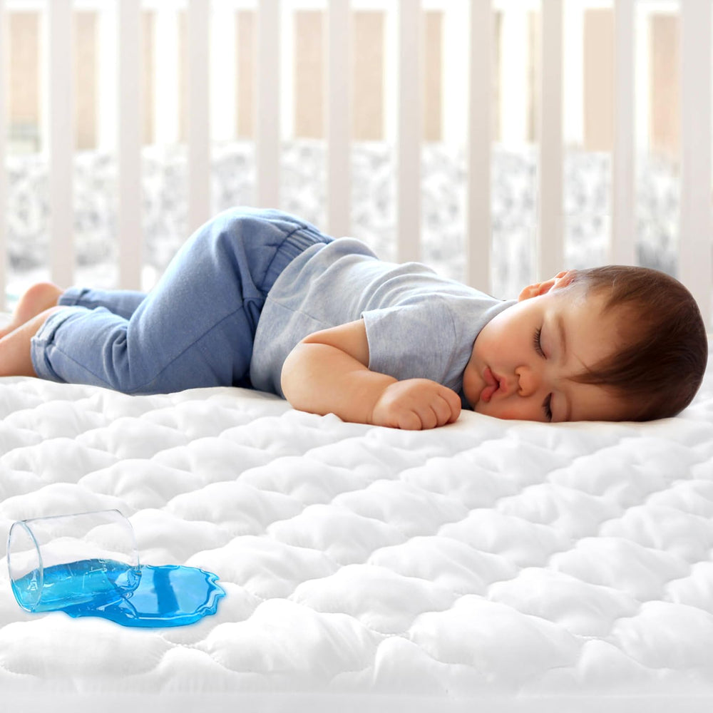 Biloban crib mattress protector with 4-layer quilted design keeps the mattress dry.
