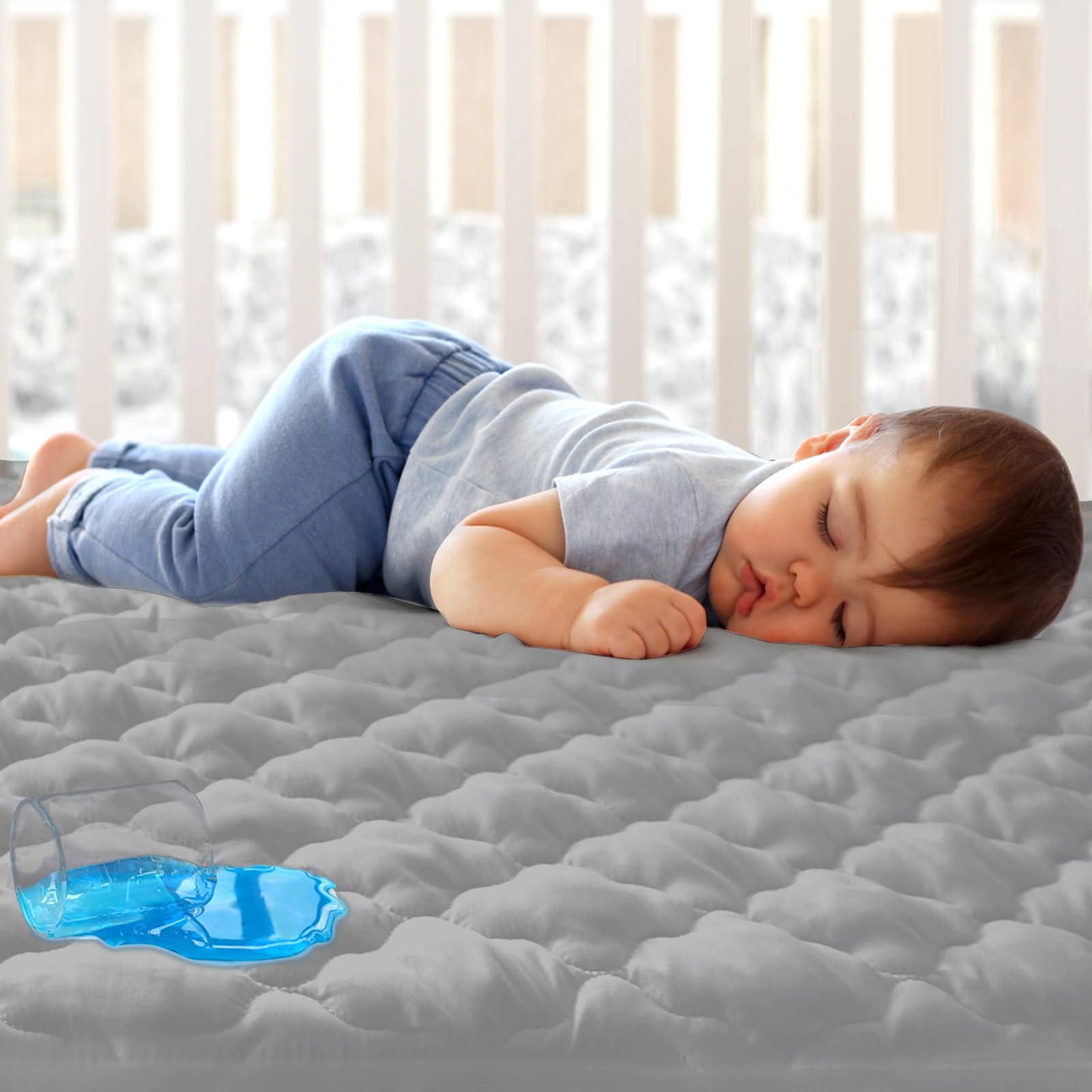 Biloban crib mattress protector quilted top provides soft protection for baby's sleep surface.