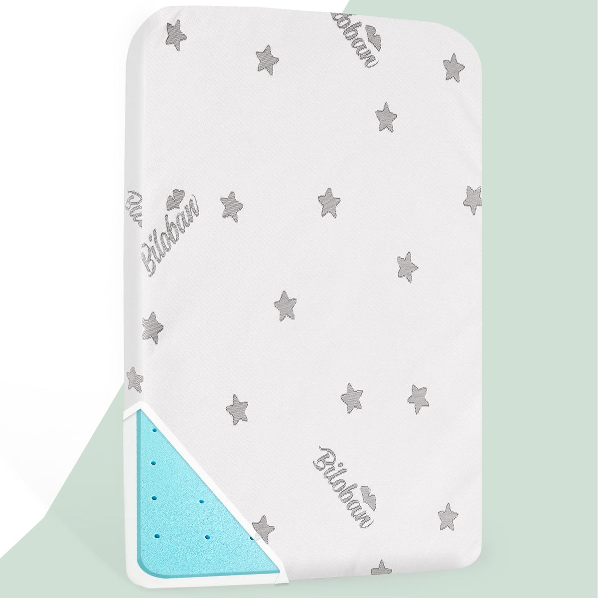 Biloban crib mattress topper waterproof cover shows shield against spills for easy cleaning.