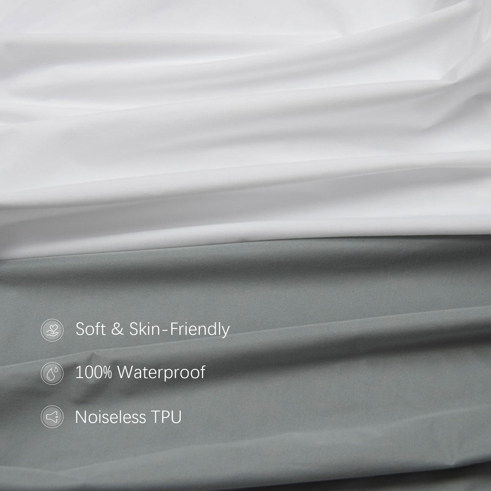 Biloban fitted sheet with elastic band for secure crib fit.