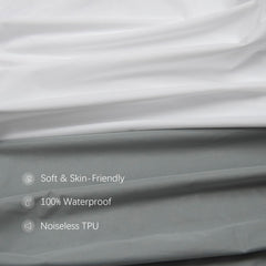 Biloban fitted sheet with elastic band for secure crib fit.