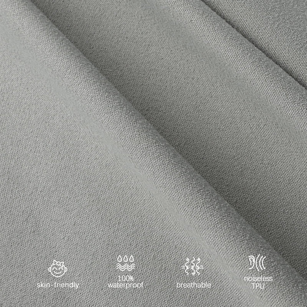 Biloban crib sheets with elastic band securing to crib mattress