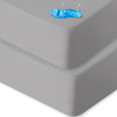 Biloban crib sheets waterproof 2-pack showing snug mattress fit