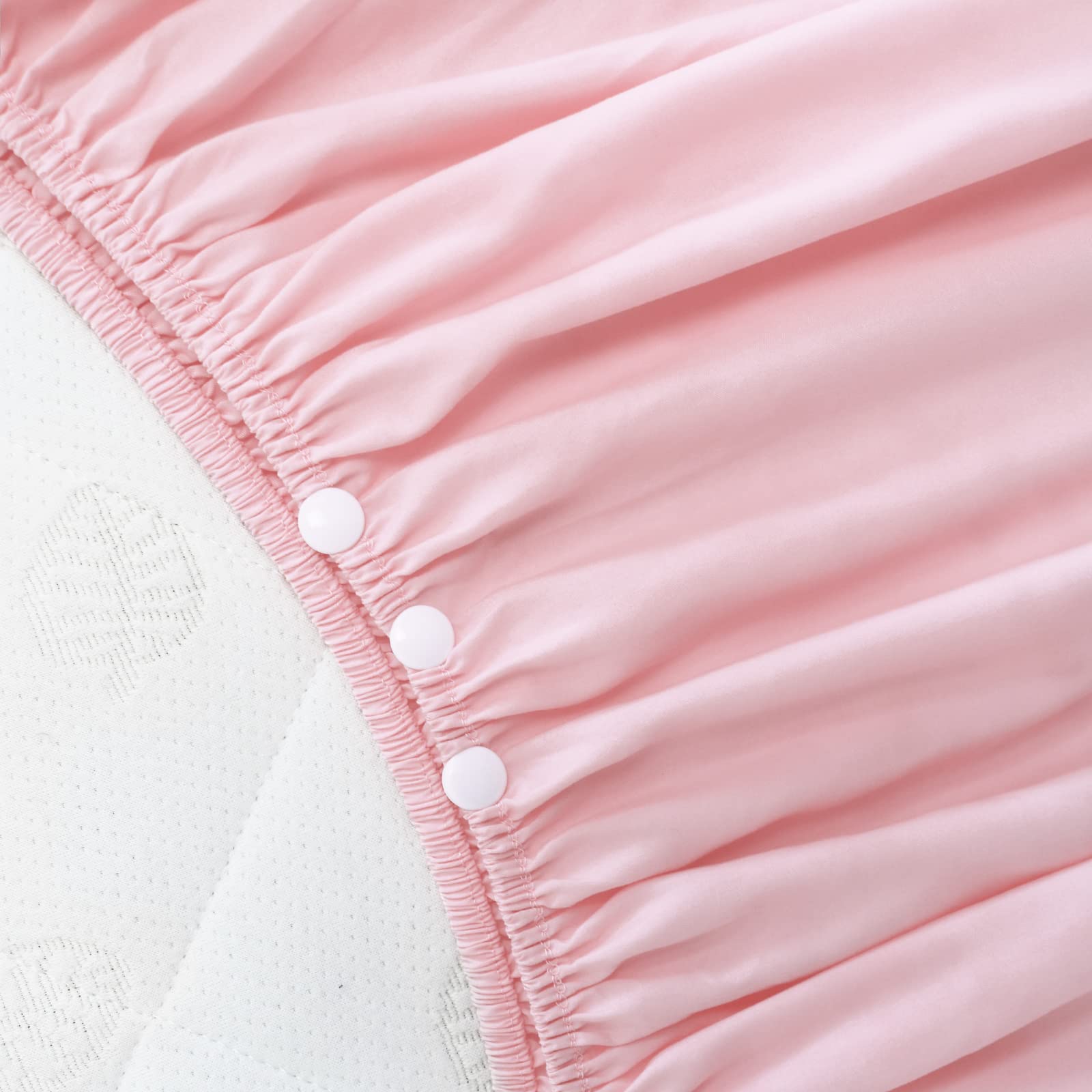 Biloban crib skirt pink pleated side view demonstrates easy attachment and secure fit
