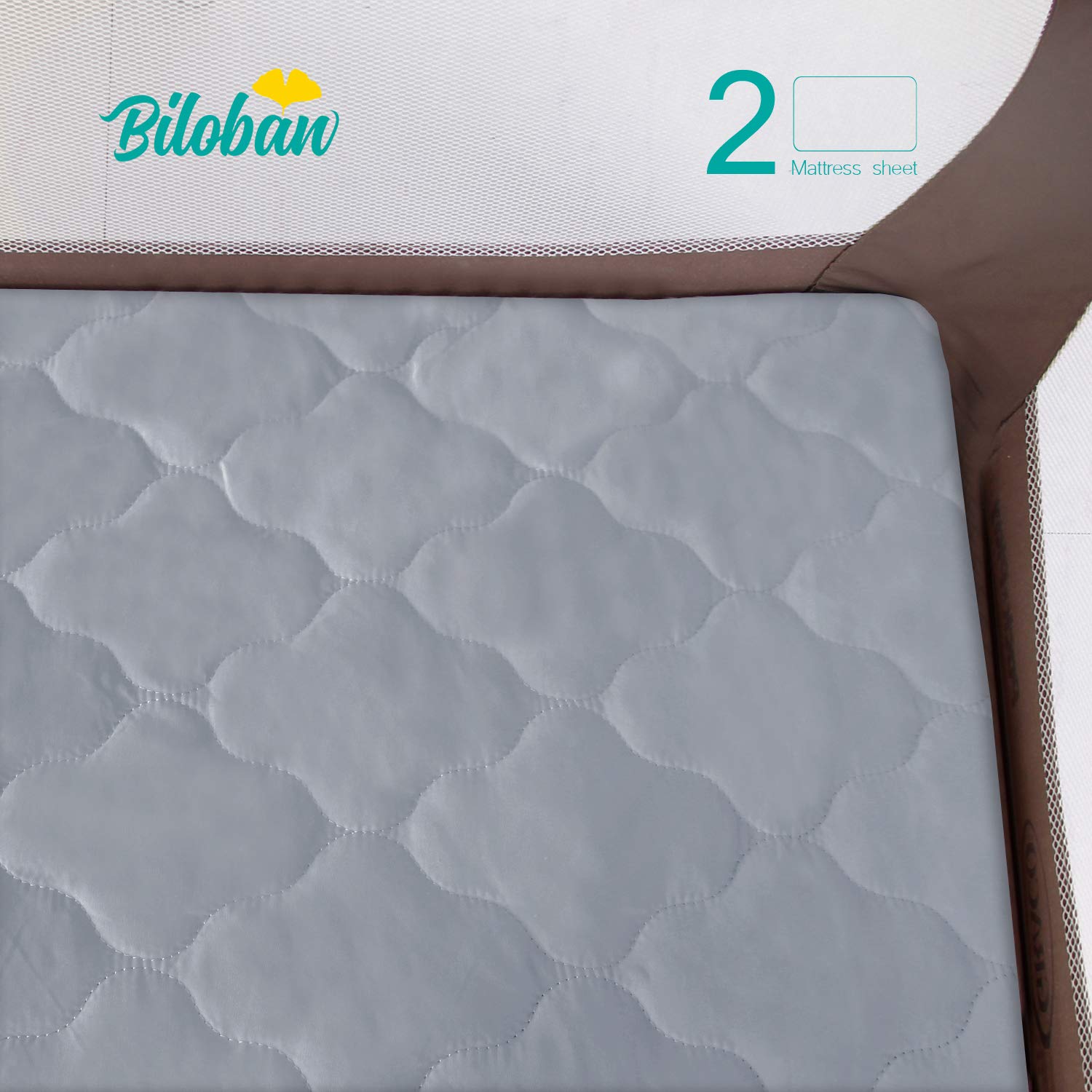 Biloban elastic deep-fit 39x27 gray demonstrates secure fit on playards and mini cribs.