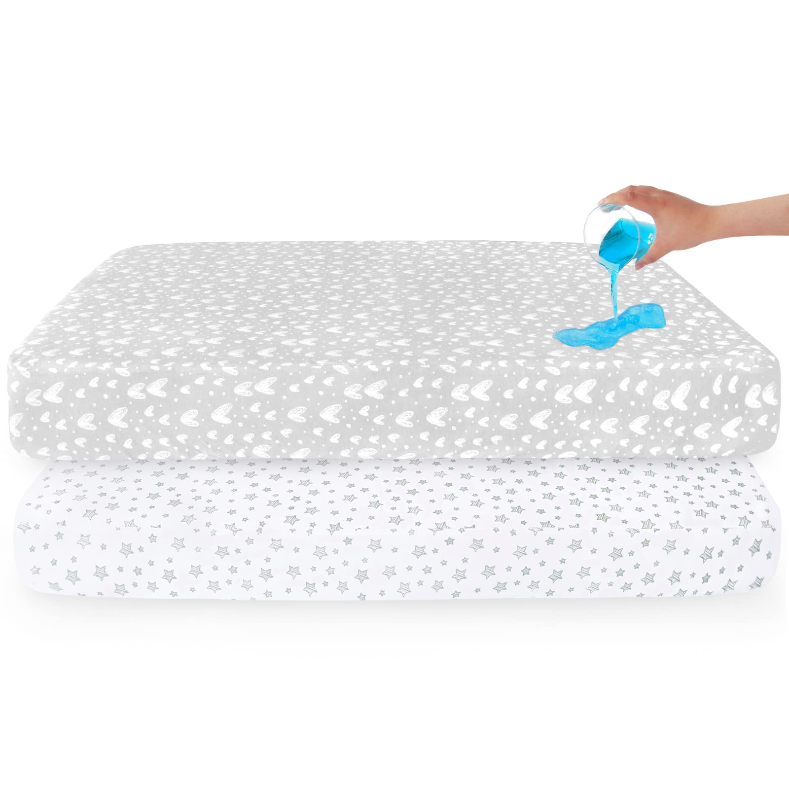 Biloban elastic-fit crib sheet closeup confirms secure, easy-to-change bedding.