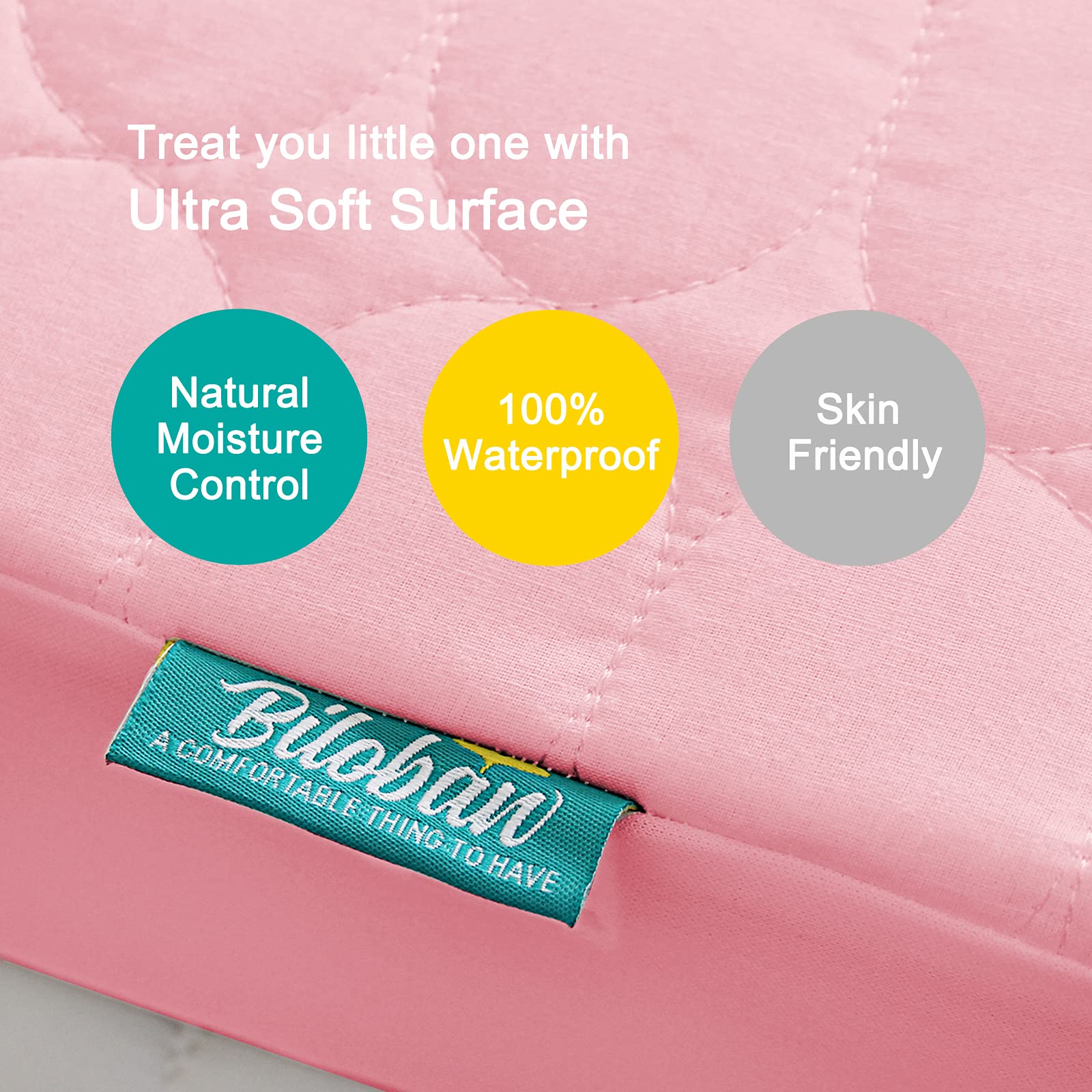 Biloban mini crib protector waterproof layer helps keep the mattress dry.