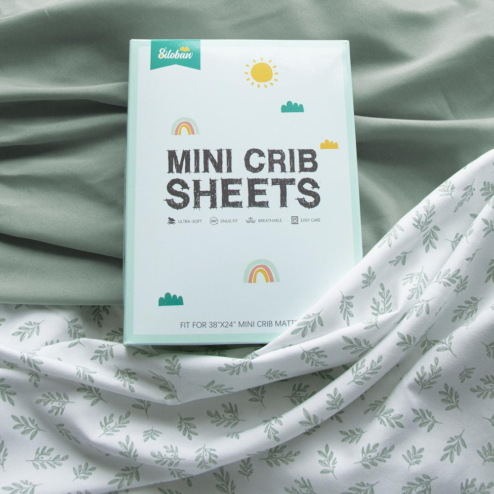 Biloban mini crib sheet soft microfiber closeup showing jersey texture for cozy nights.