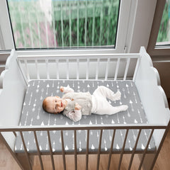 Biloban mini crib sheets fabric close-up shows a soft microfiber touch for baby comfort
