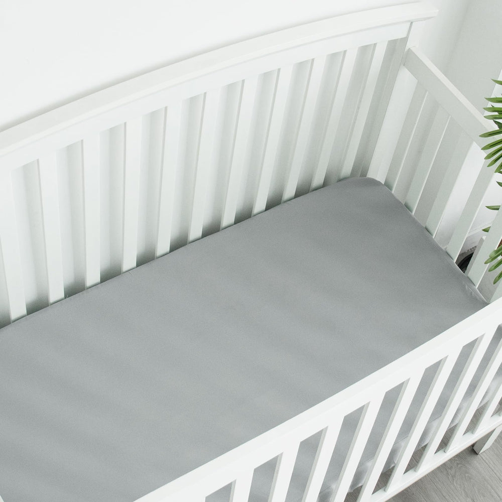 Four-pack Biloban sheets offer versatile color options for nursery decor.
