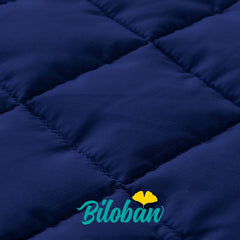 Biloban nap mat dark blue quilted fabric close-up demonstrates durability.