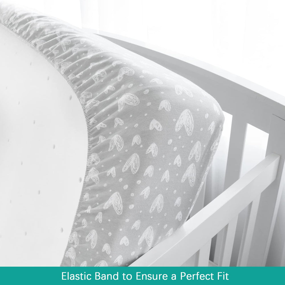 Biloban organic cotton crib fitted sheet demonstrates soft breathable fabric for baby sleep.