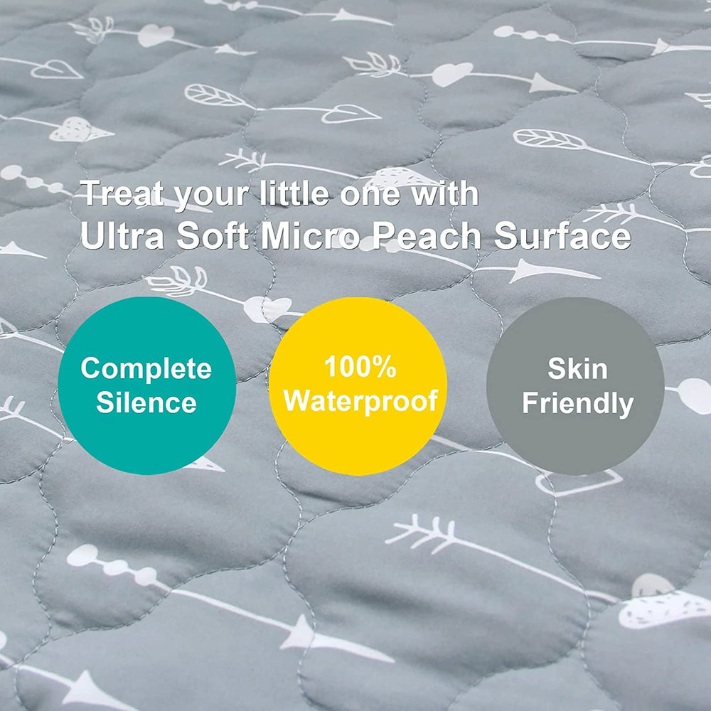 Biloban elastic skirt-fit highlights secure fit around mini mattress for safer protection.