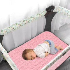 Biloban waterproof coverage shields playard from spills with quiet TPU layer