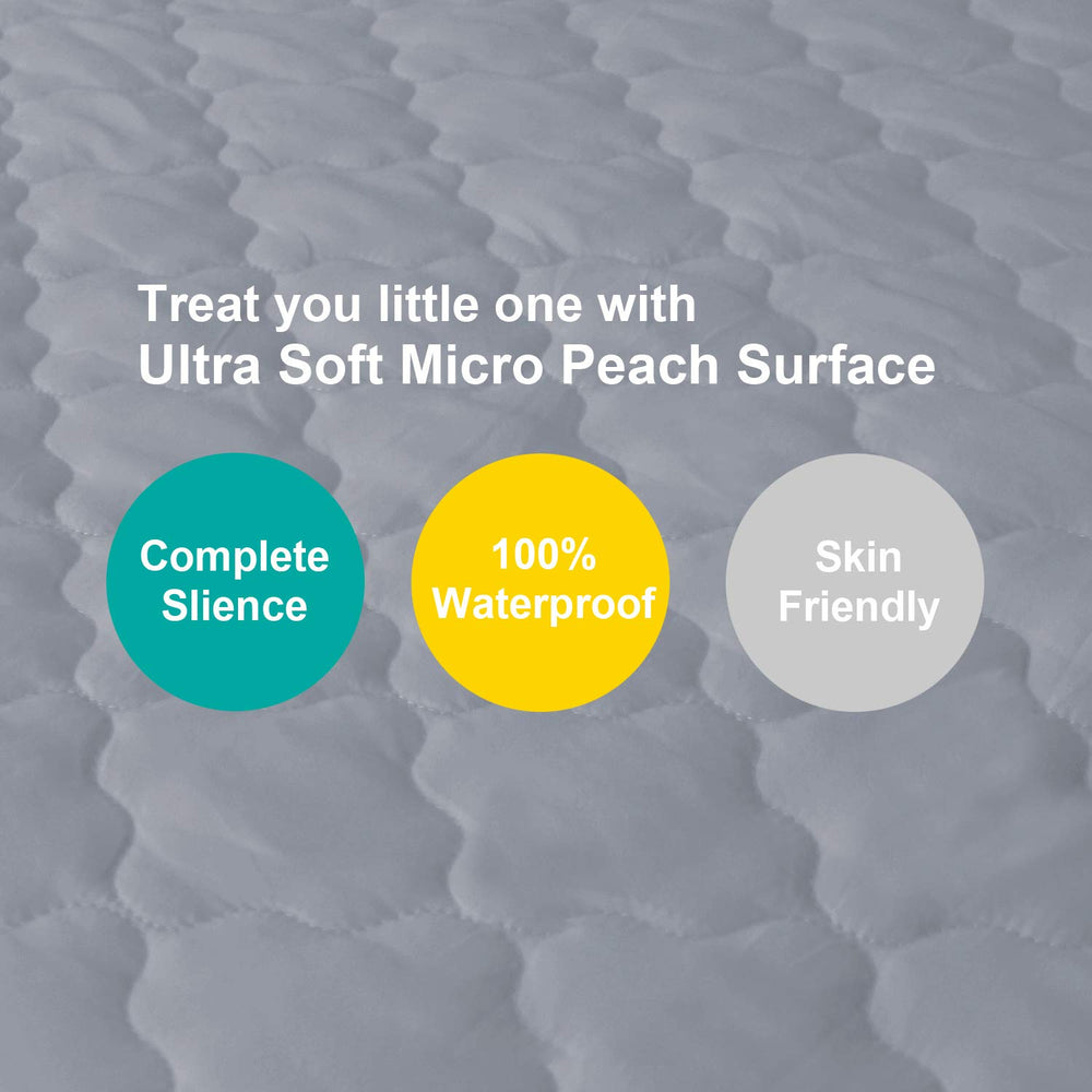 Biloban pack-n-play mattress protector gray on mattress demonstrating snug fit.