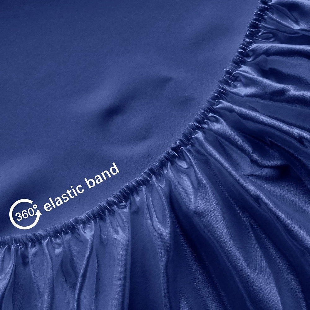 Biloban satin mini crib sheet closeup shows smooth fabric for gentle baby skin.