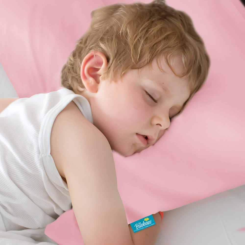 Biloban satin toddler pillowcase pink fabric texture emphasizes reducing nighttime friction for curly hair