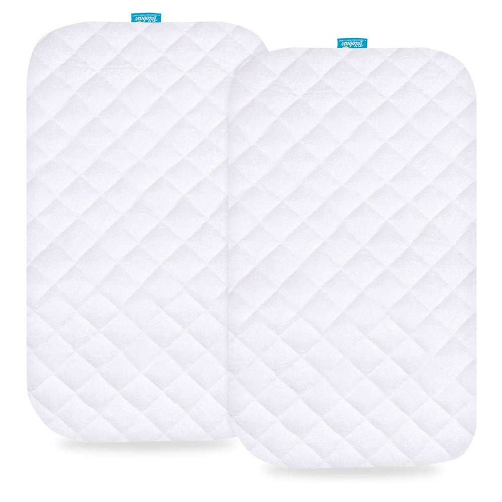 Biloban waterproof bassinet mattress pad cover on a bassinet shows a dry sleeping surface.