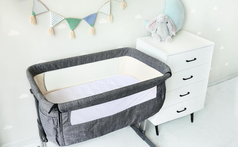 Biloban white grey bassinet mattress pad blends with nursery decor