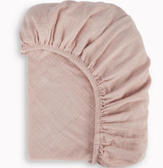 BIOWEAVES bassinet sheet soft muslin close-up shows breathable fabric for newborn comfort