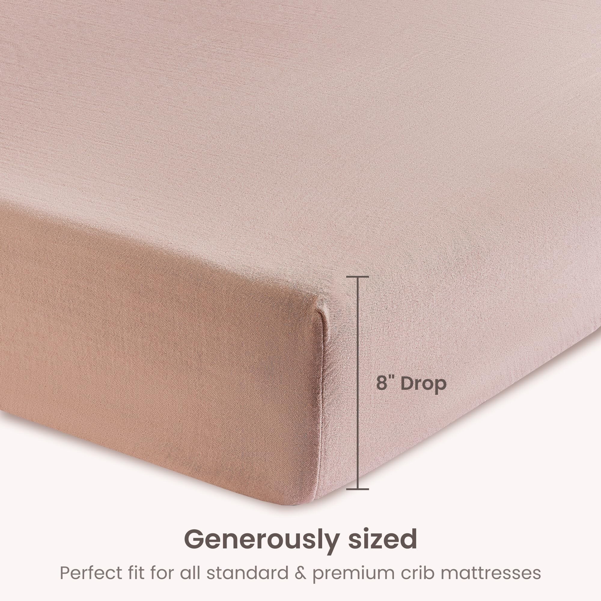 BIOWEAVES dusty pink bassinet sheet on mattress highlighting color and fit