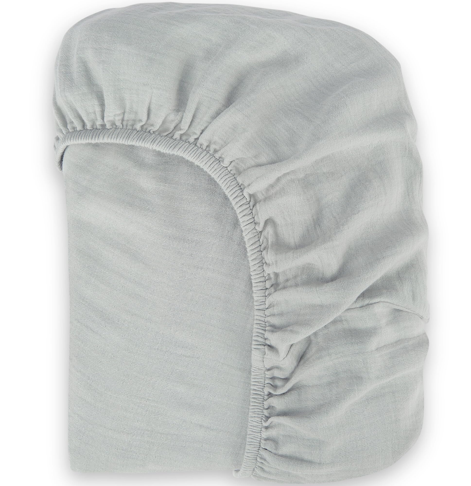 BIOWEAVES organic muslin cotton sheet closeup shows soft, breathable fabric for delicate baby skin