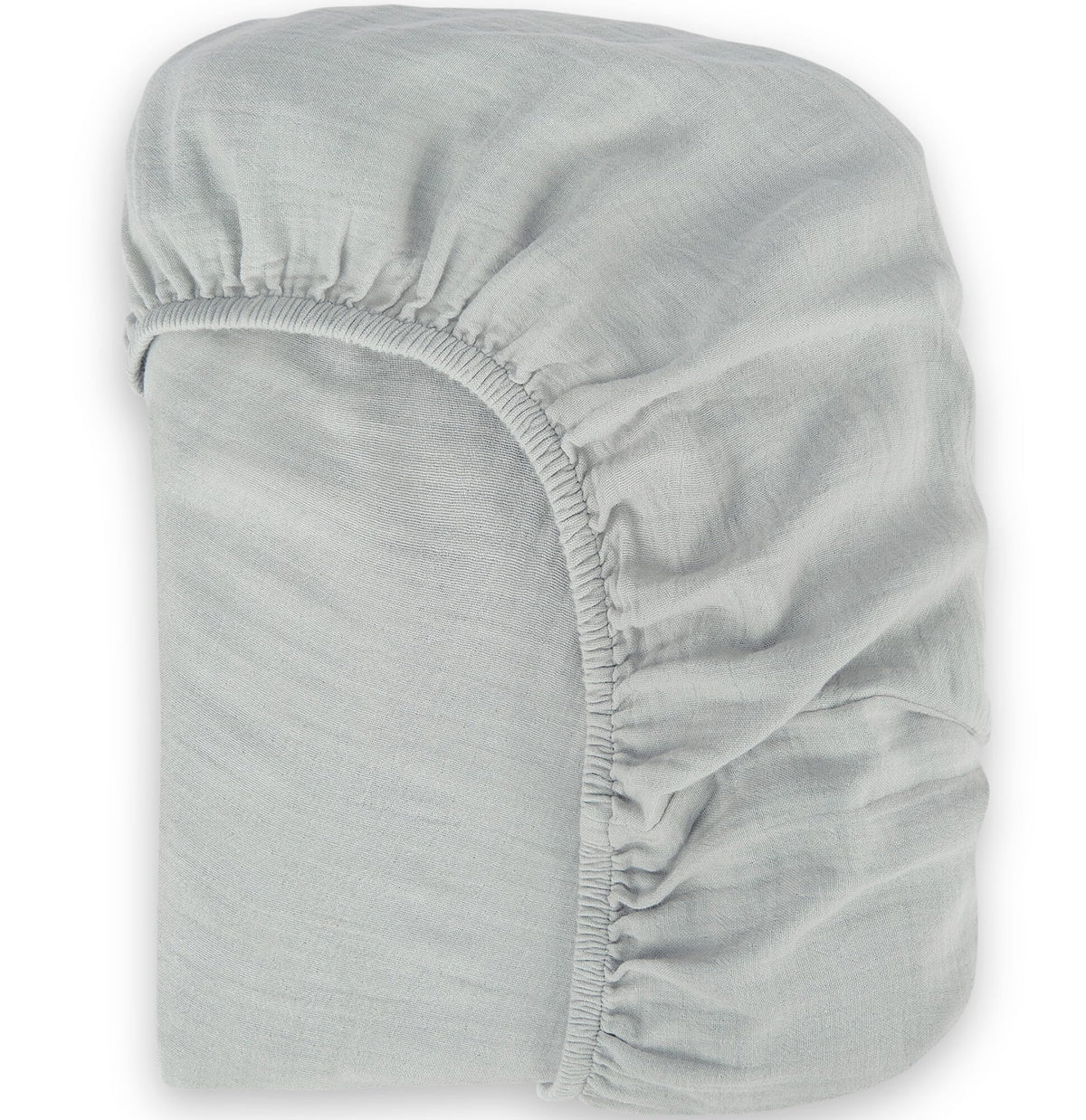 BIOWEAVES organic muslin cotton sheet closeup shows soft, breathable fabric for delicate baby skin
