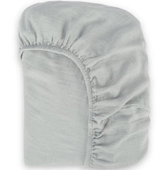 BIOWEAVES organic muslin cotton sheet closeup shows soft, breathable fabric for delicate baby skin