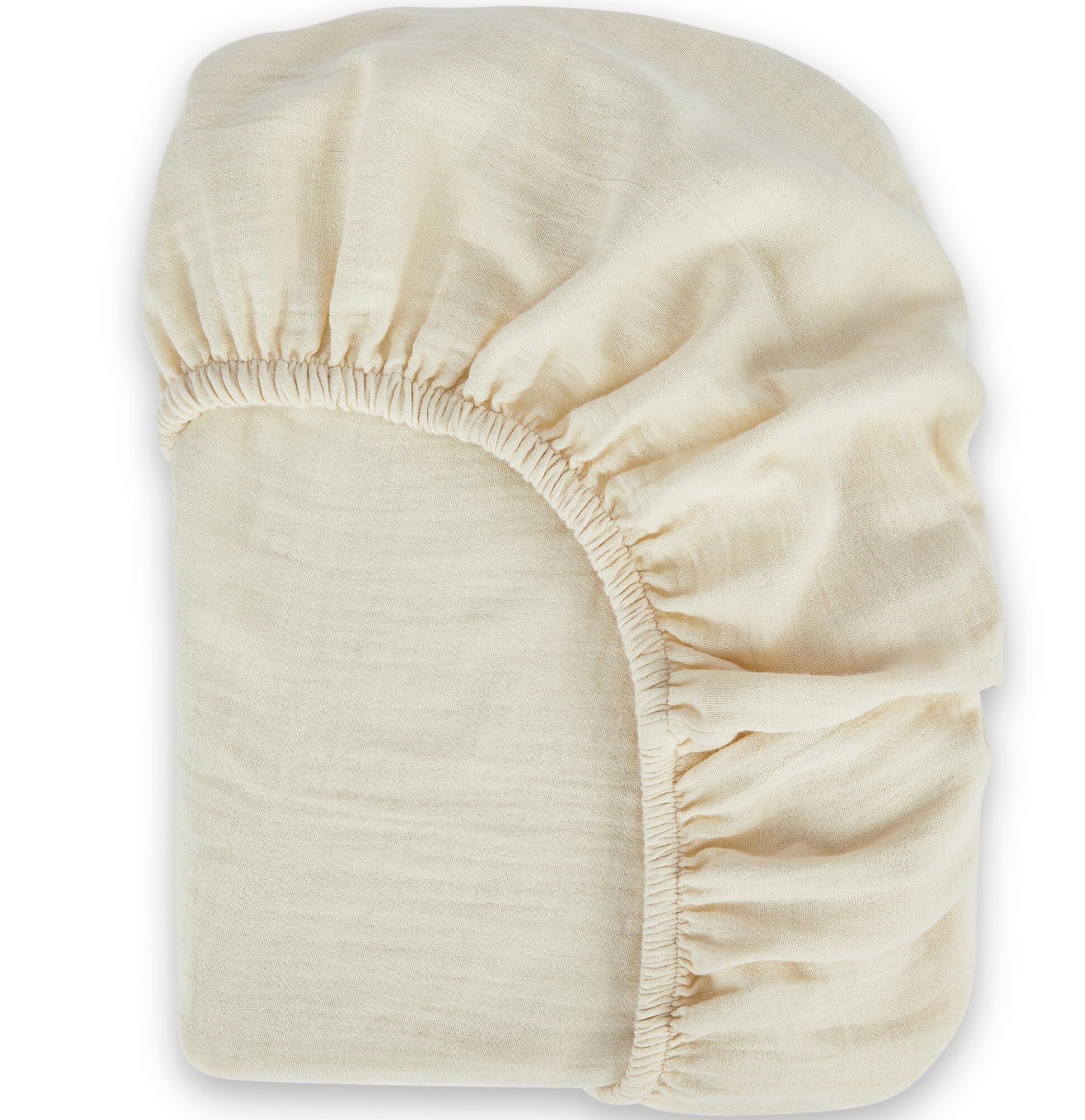 Bioweaves organic muslin crib sheet close-up shows soft breathable texture for delicate baby skin.
