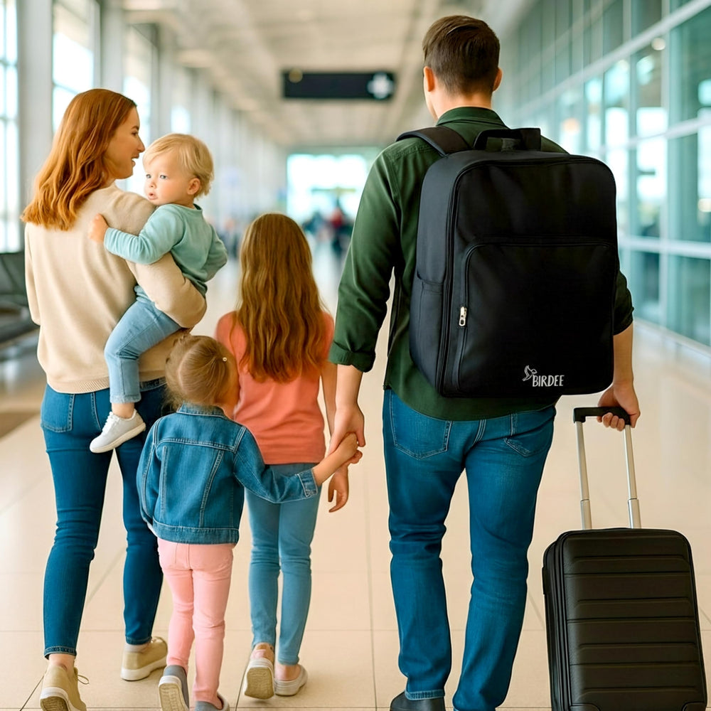 Birdee Bugaboo Butterfly travel bag in use at airport for hands-free transport.