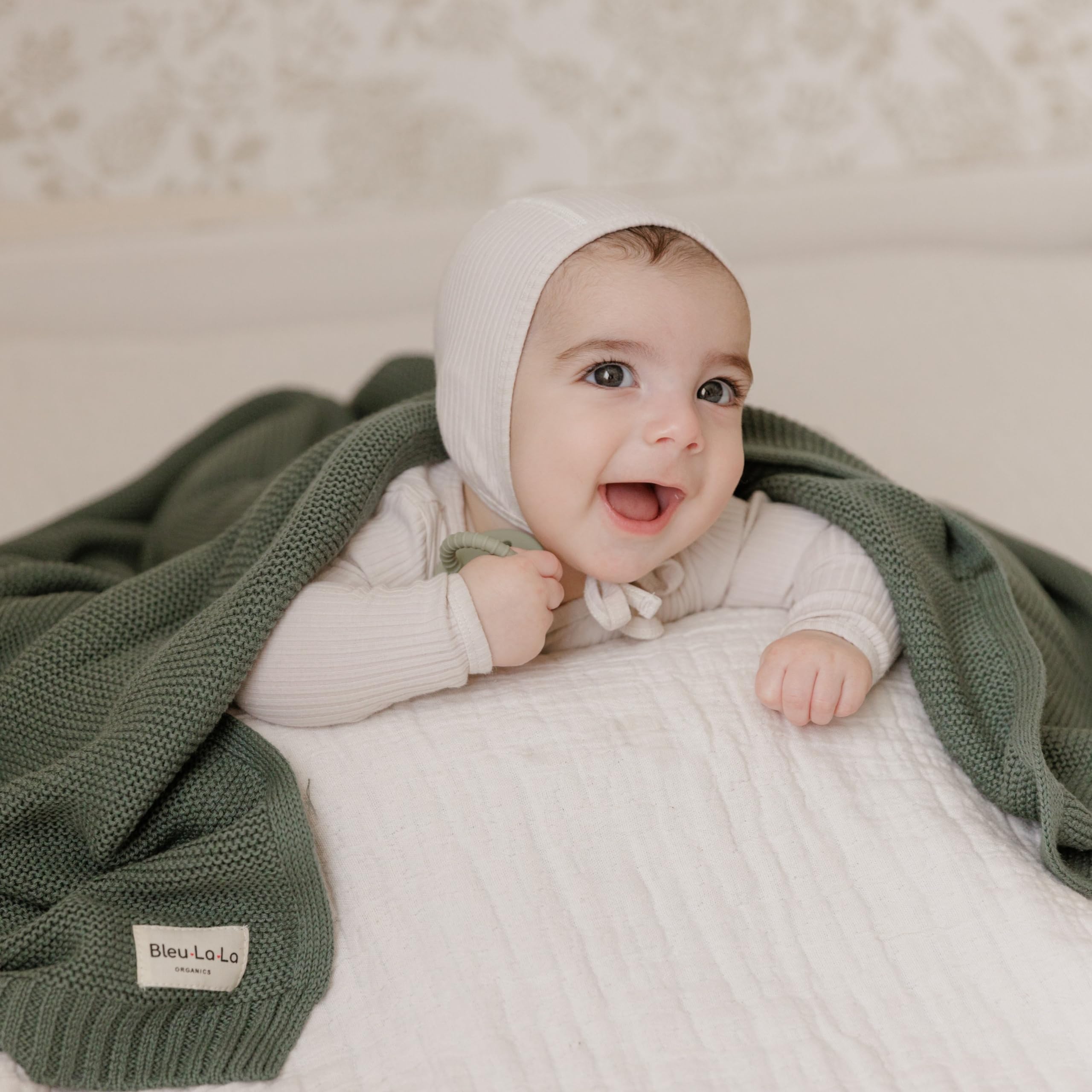 Bleu La La swaddle in denim blue folded for cozy baby snuggle.