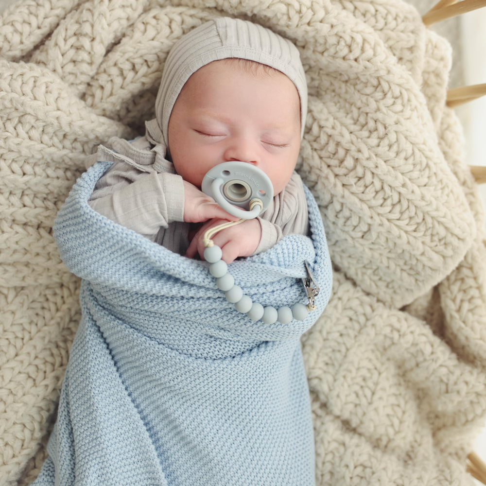 Bleu La La gift-ready swaddle in denim blue for baby showers.