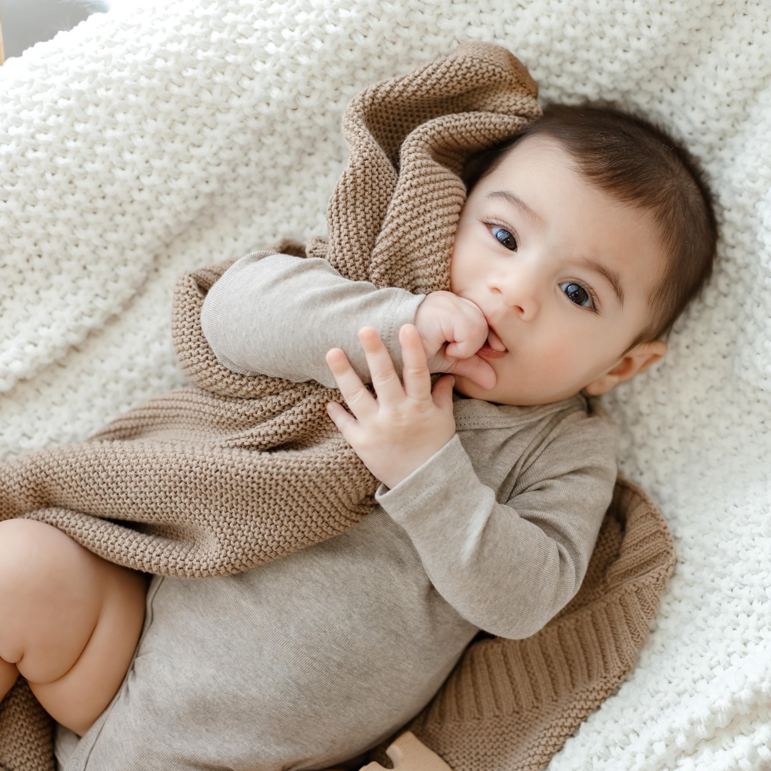Bleu La La swaddle blanket in denim blue used for toddler cuddles.