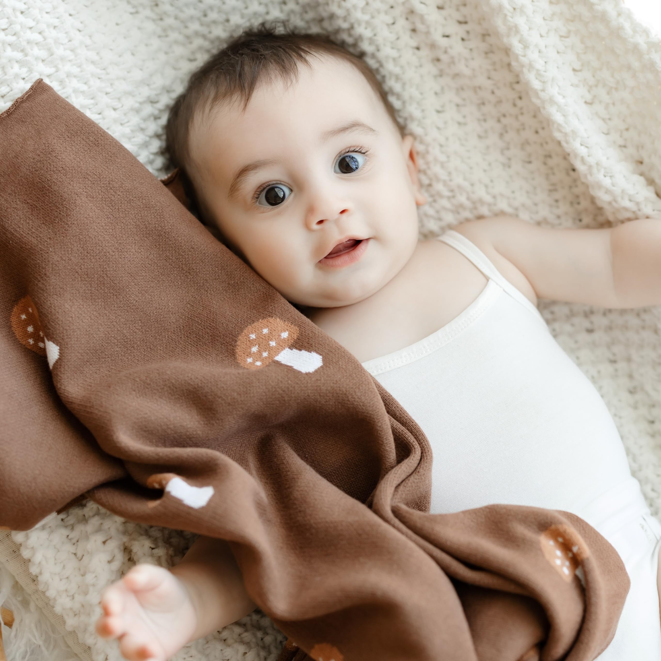 Bleu La La knit blanket mushroom mocha fits stroller and car seat for travel.