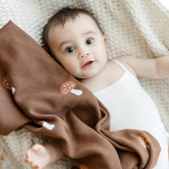 Bleu La La knit blanket mushroom mocha fits stroller and car seat for travel.