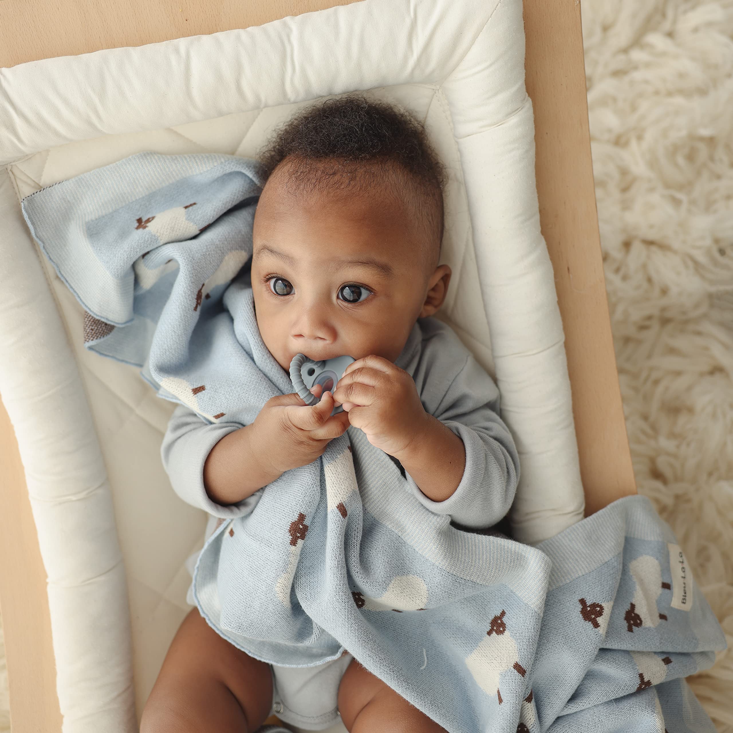 Bleu La La knit baby swaddle 36x32 size is versatile for different ages