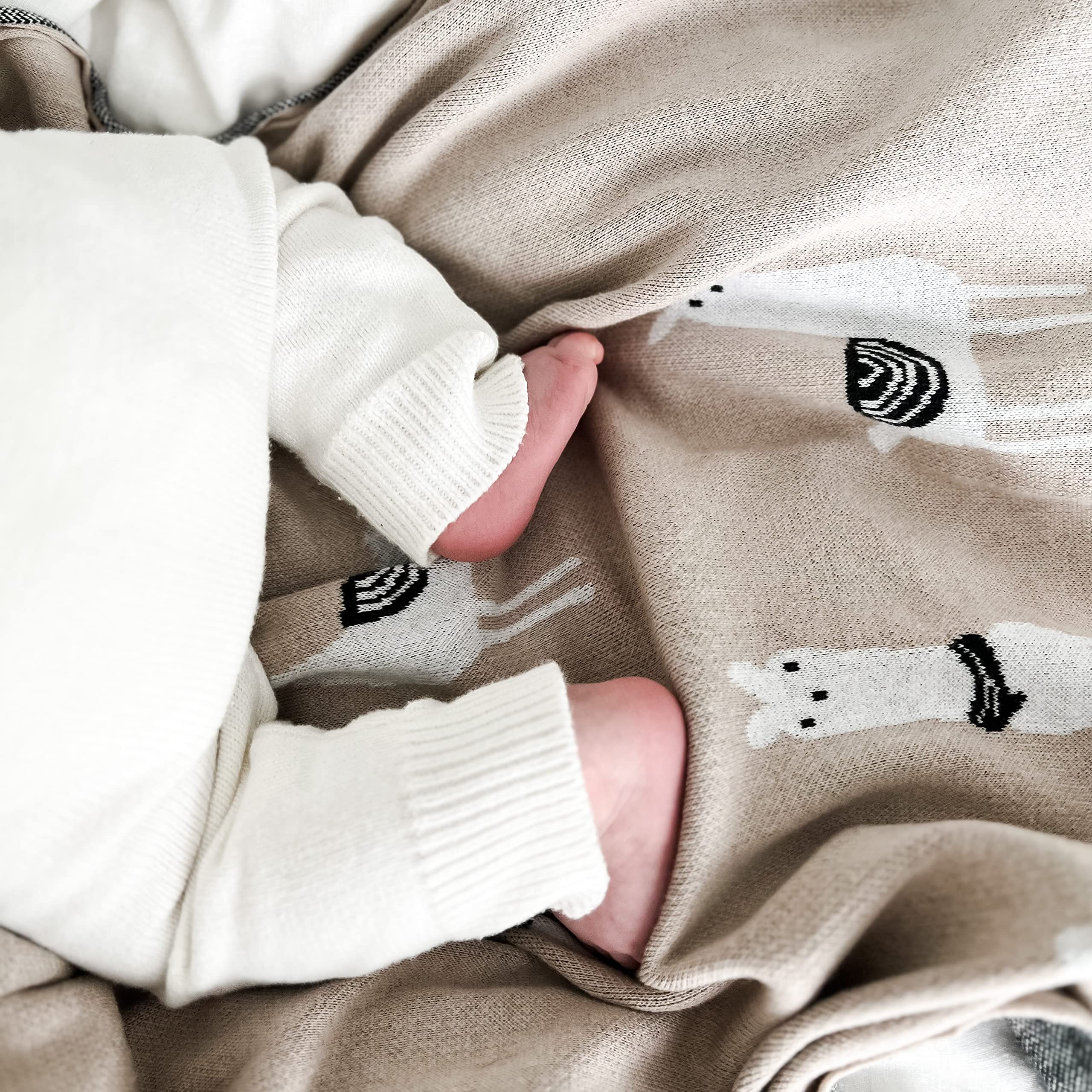 Bleu La La knit blanket offers durable snuggling for naps and playtime.