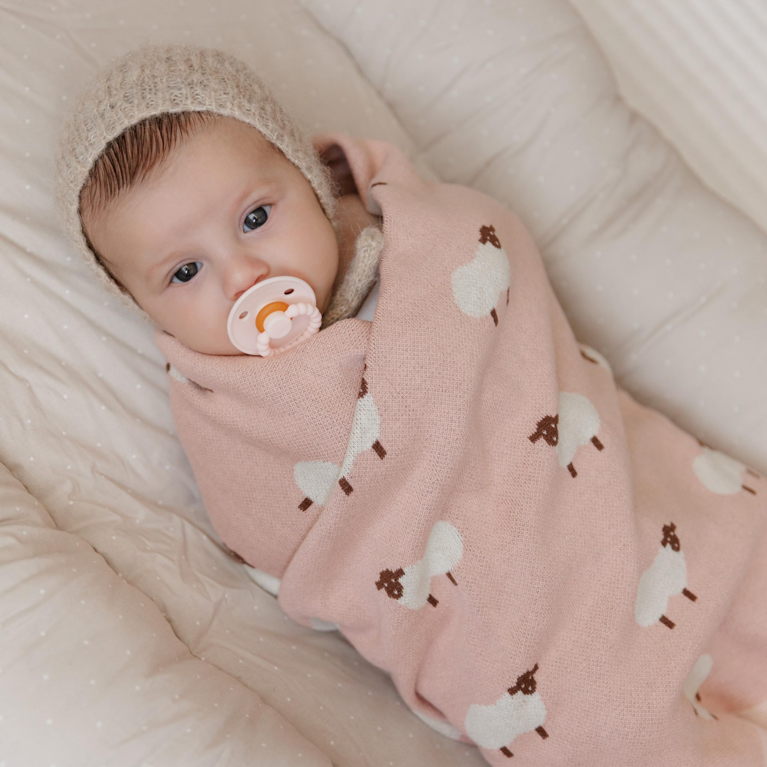 Bleu La La knit cotton texture highlights cozy, breathable warmth for year-round baby comfort.