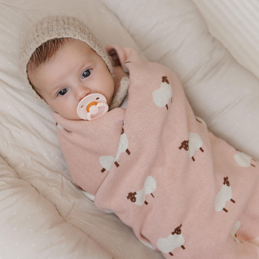 Bleu La La knit cotton texture highlights cozy, breathable warmth for year-round baby comfort.