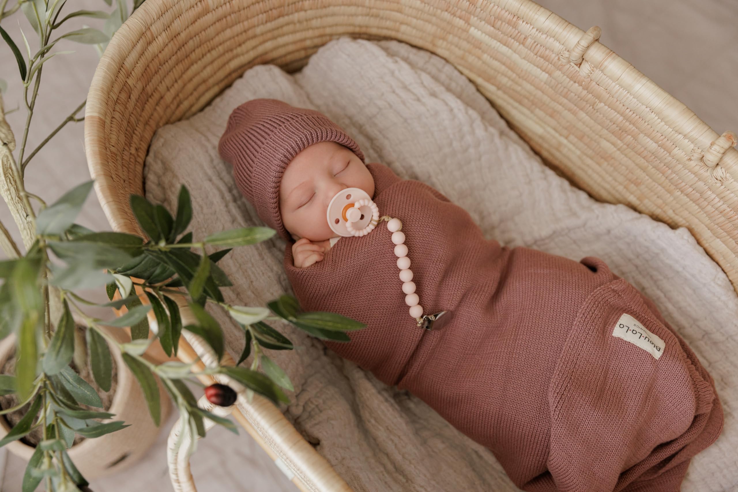 Bleu La La Luladream blush pink pacifier on soft surface for comforting moments