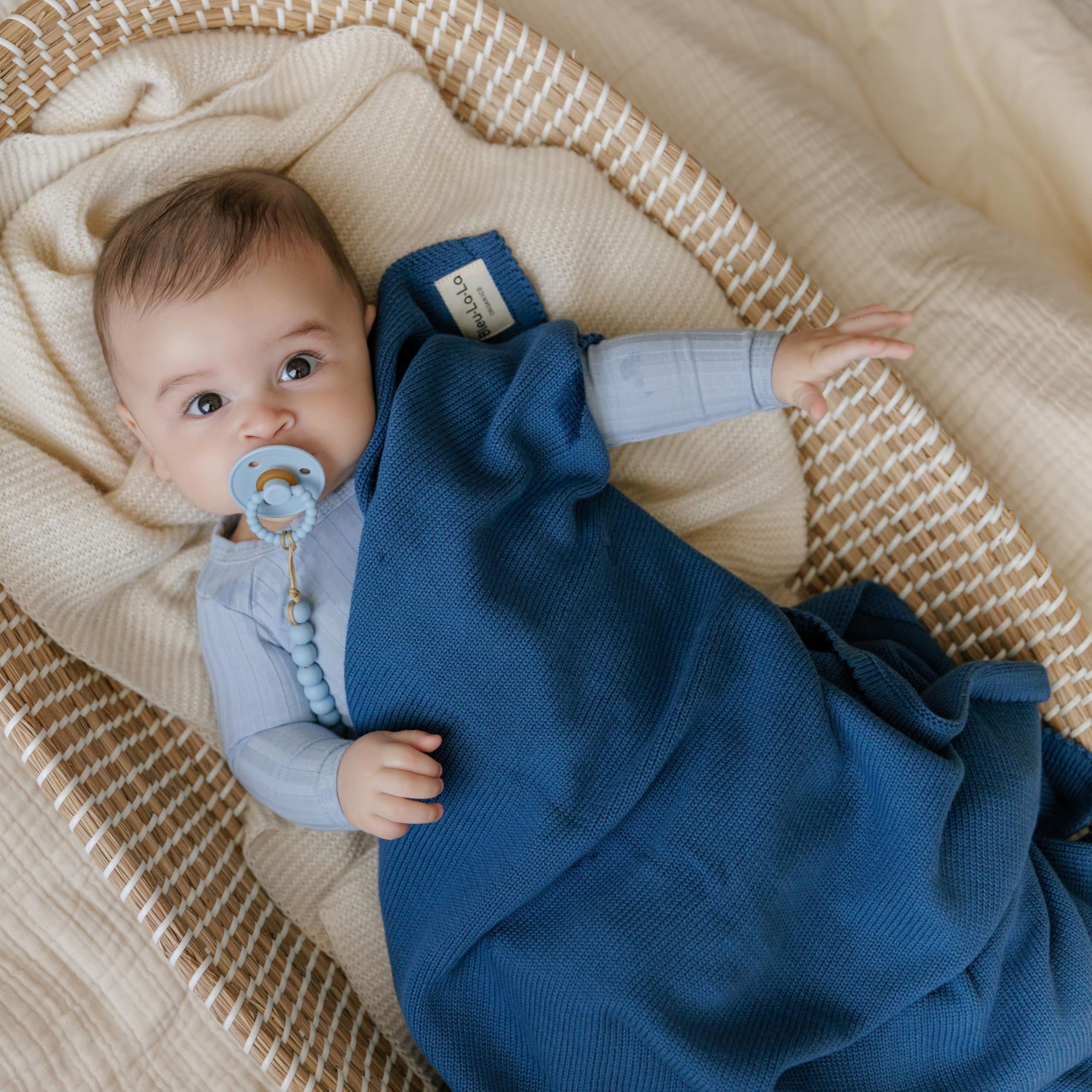Bleu La La Luxe swaddle in denim blue, ideal for swaddling and stroller outings.