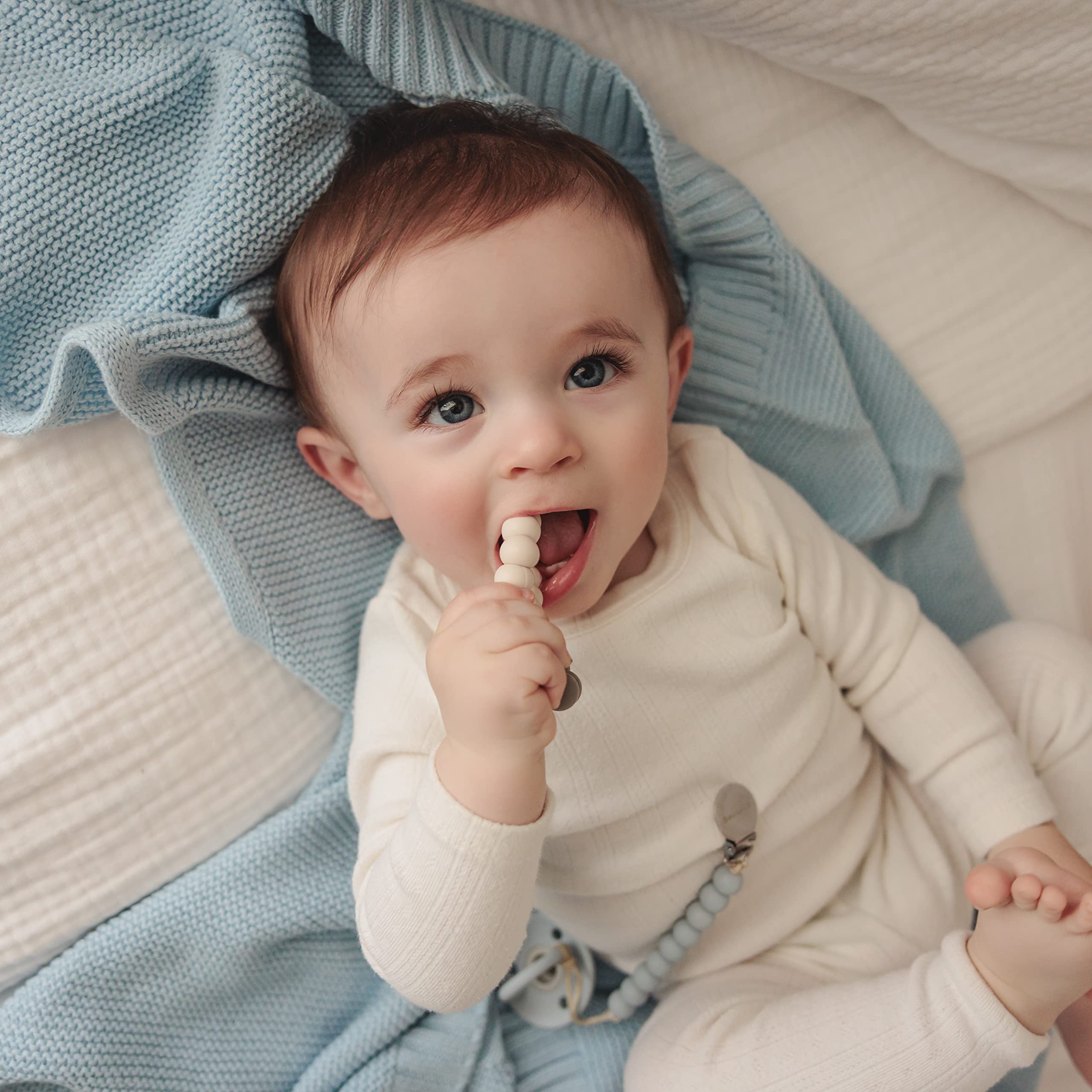 Bleu La La machine-washable baby blanket stays durable and soft after cycles.