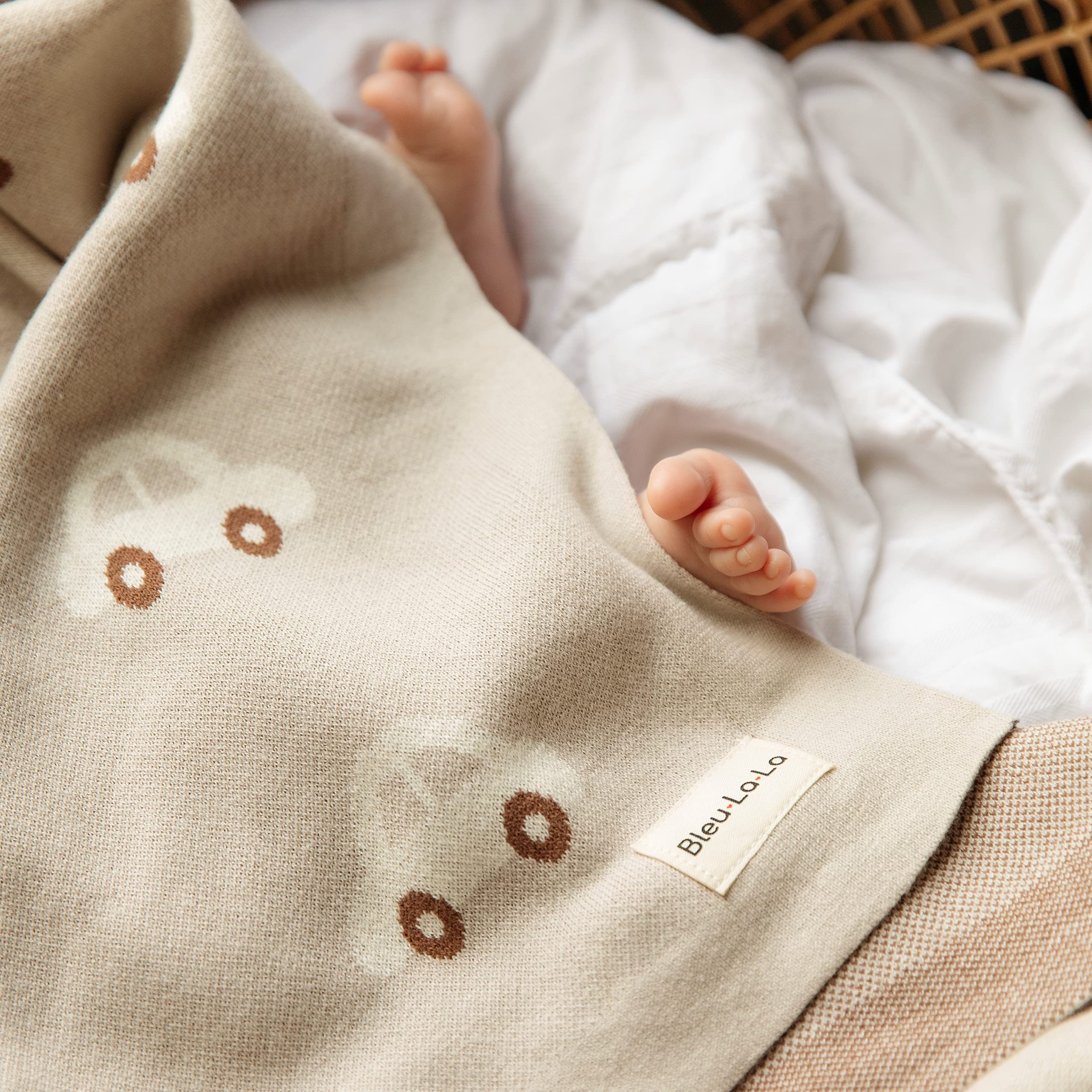 Bleu La La machine-washable swaddle for easy care.