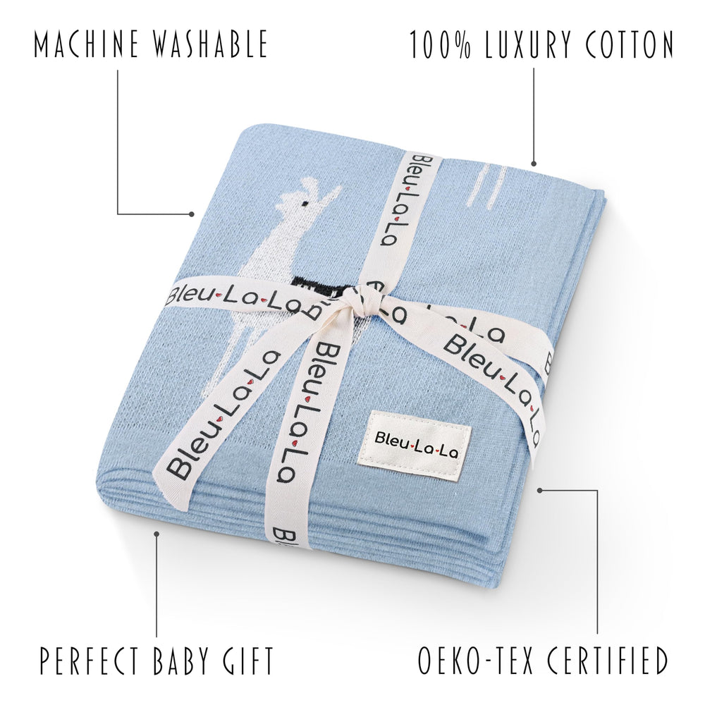 Bleu La La nursery decor swaddle blanket enhances crib setup with universal warmth.