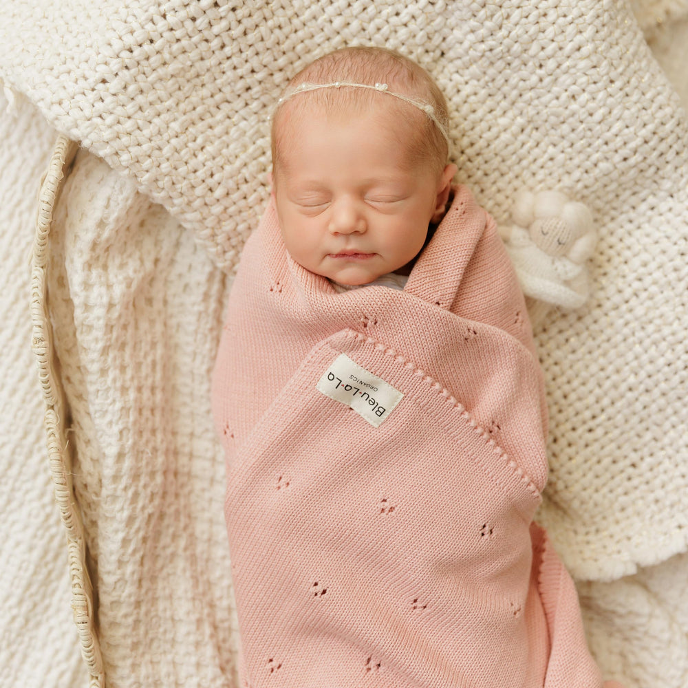 Bleu La La Pointelle Swaddle Organic Cotton Fiber; breathable texture supports year-round comfort.