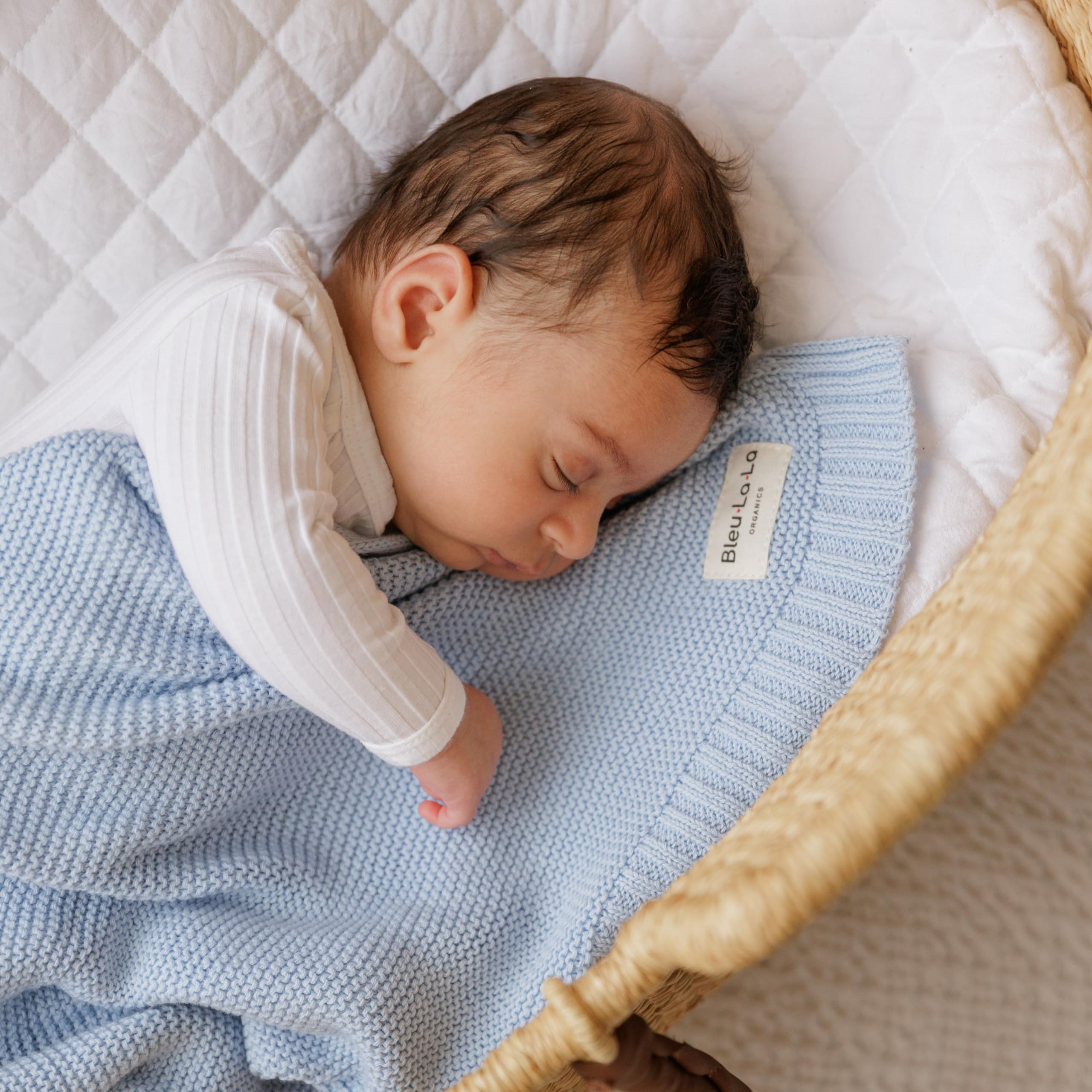 Bleu La La blanket fits strollers and car seats for on-the-go comfort.
