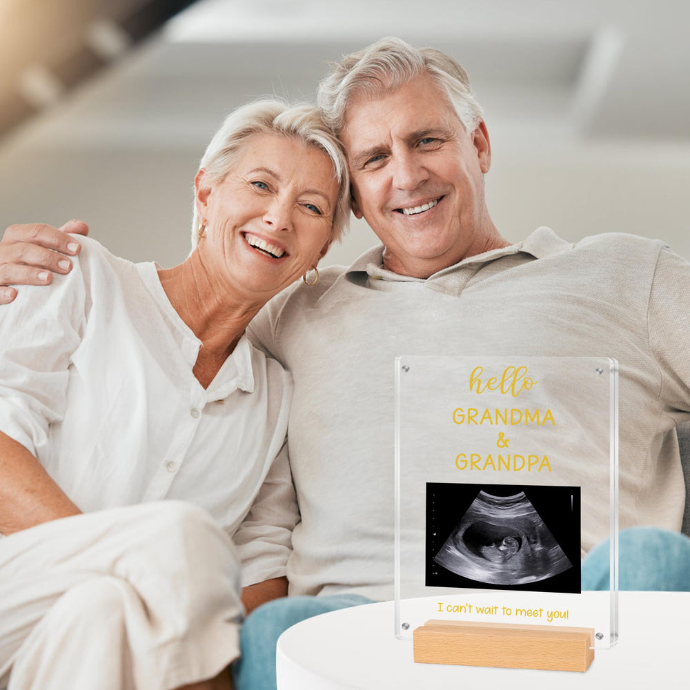 Blinking Stars frame with gold script greeting for a heartfelt grandparent announcement.