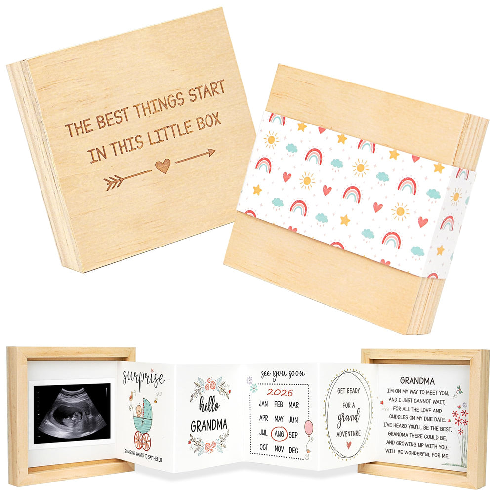 Blinking Stars pregnancy-announcement box close-up showing engraved message and pinewood keepsake quality.