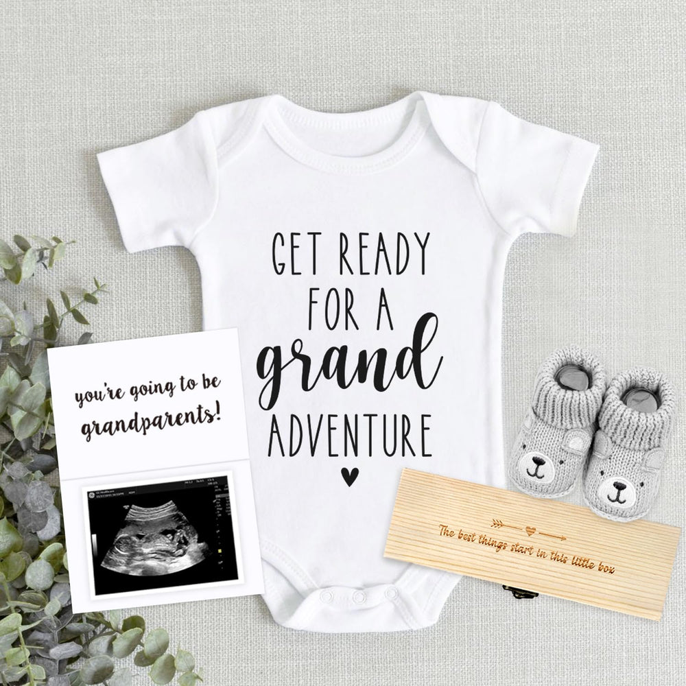 Blinking Stars newborn onesie in soft cotton ready for a photo-friendly grandparent reveal