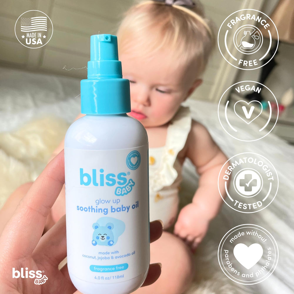 Bliss Baby Oil texture close-up showing silk-like, fast-absorbing formula for sensitive skin.